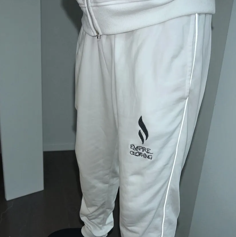 Empire Clothing – White Reflective Track Pants